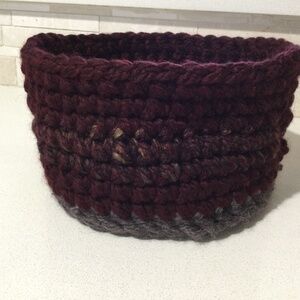 Hand crocheted 8” diameter 5.5” high basket with handles